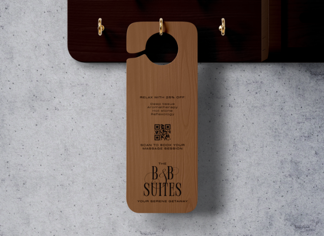 Custom wooden hotel door hanger promoting "The B&B Suites" with a 25% off massage offer and a QR code to book
